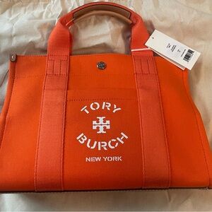 Tory Burch Tangerine Canvas Tote Bag 
NWT dust bag and gift bag included